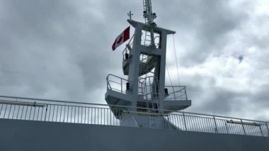 the deck of the ship on which the canadian flag is flying can be seen the sky travel trip Canada to Vancouver Island Ferry. High quality 4k footage