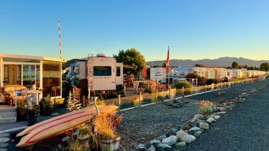 sunset on Ocean Horizon mountains are far visible many clouds and bright colors slow motion video suitable for music relaxation background For text silence peace Parksville beach Surfside RV resort