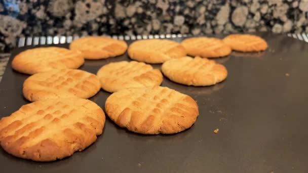 Delicious Shortbread Cookies Orange Color Lie Brown Baking Sheet Black — стоковое видео