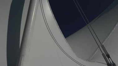 Canada Place Big famous sails that are in the center of Vancouver and head Canada places The camera pans slowly while filming them Against the backdrop of dark blue skies and beautiful weather.