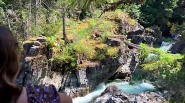 Traditional territory of the Kwalikum First Nation Little Qualicum Falls Provincial Park Clean clear and cold water Waterfall and Forest River The camera moves slowly Canada Vancouver Island.