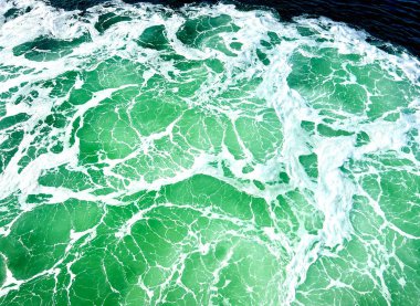 seamless green stone texture - abstract background Blue green sea with waves and foam. High quality photo