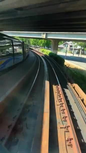 Train Traveling Road Another Skytrain Coming Front Window Driverless Subway — Vídeos de Stock