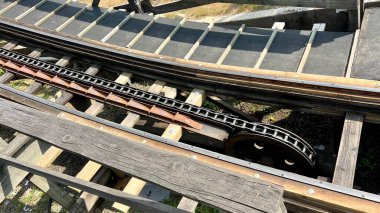 Roller coaster NPE Pleasure park for children and adults swings and attractions Evening lights on swing Scary creepy swing in park Playland is an amusement park in Vancouver, British Columbia, Canada.