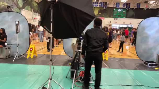 Several Photographers Take Pictures Schoolchildren Photo Shoot Gym School Album — ストック動画