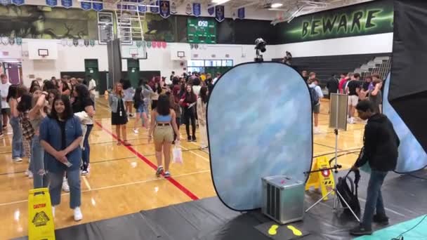 Several Photographers Take Pictures Schoolchildren Photo Shoot Gym School Album — стоковое видео