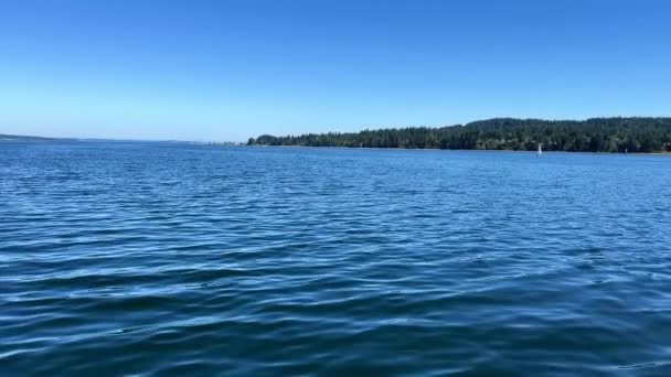 a view of a sailing ship on the sea and a horizon of dark blue the ocean and the sky can be both lake deep-water river in any country this landscape is similar ferry to Vancouver Islands yacht or boat