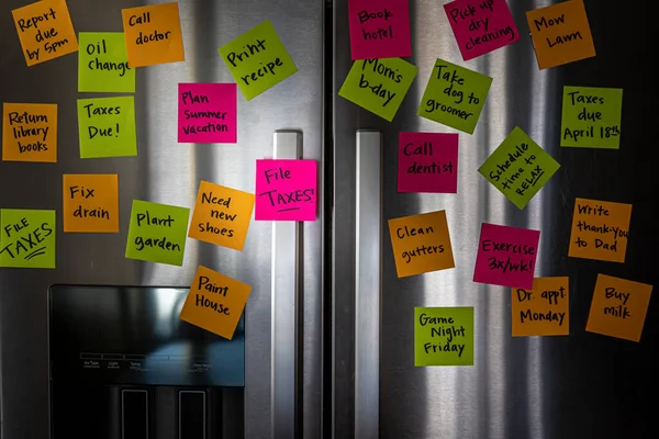 Refrigerator Door Colorful Memo Notes Reminding File Taxes 스톡 이미지