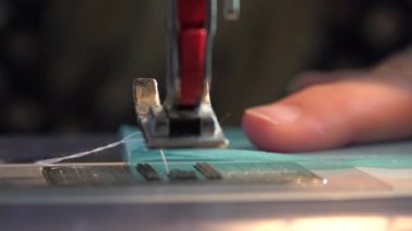 Close Up of Sewing Machine as Person Sews