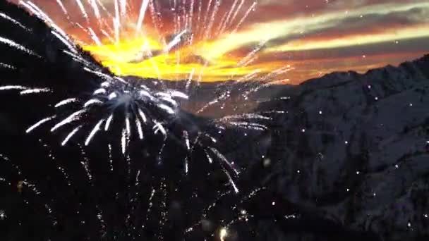 Composite Fireworks Aerial Sunset Snow Covered Mountains — Stock Video