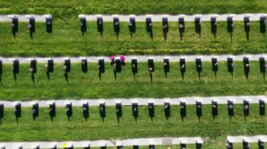 Drone Aerial Above a Military Cemetery Flying Over Rows of Headstones