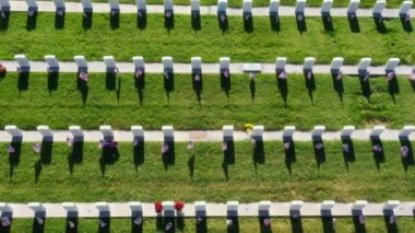 Drone Aerial Above a Military Cemetery Flying Over Rows of Headstones