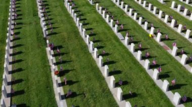 Drone Aerial Rotating Counter Clockwise Around Military Headstones Cemetery