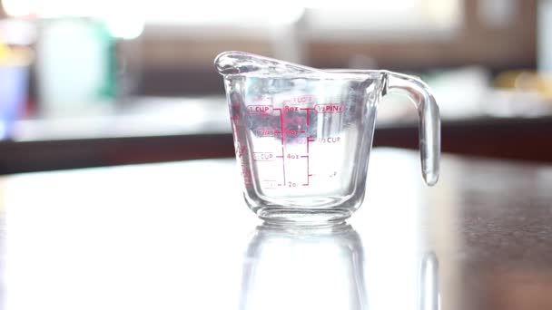One Cup Milk Being Poured Measuring Cup — Video