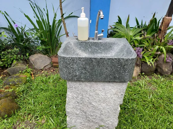 photo of hand washing with soap