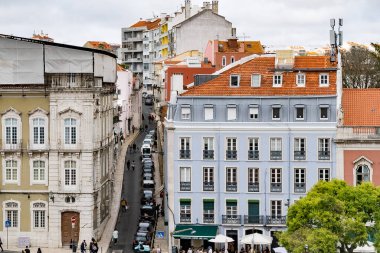 Panoramic landscape with houses and view of the Tagus river. Lisboa, Portugal.