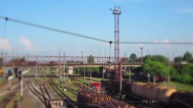 The train arrives at the station timelaps. Ukraine, Konstantinovka station. Panorama of station. With tilt-shift blur