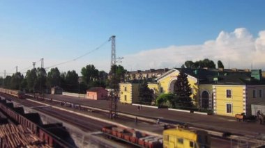 The train arrives at the station timelaps. Ukraine, Konstantinovka station. With tilt-shift blur