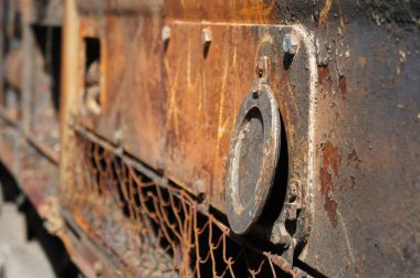 Close-up of details of old destroyed military equipment. Destroyed Russian equipment turned into scrap metal. During the battle, Russian military equipment was destroyed by the Ukrainian army.