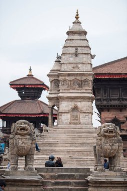 Katmandu, Nepal - 20 Mart 2022: Patan Durbar Meydanı Lalitpur şehrinin merkezinde yer almaktadır. Patan bilinen en eski Budist kentidir. Hinduizm ve Budizm 'in merkezidir..