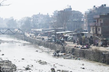 Kathmandu, Nepal,  April 20,2022 : Garbage and plastic pollution on the river bank in Kathmandu.