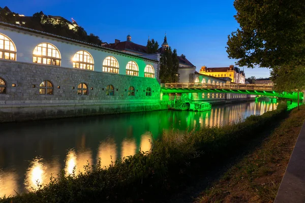 Butchers\' Bridge and the central market building in Ljubljana in the evening