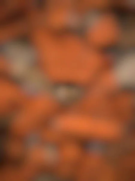 Ezilmiş tehlikeli parçaların odaklanmış soyut arkaplanı