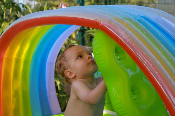 Son Playing His Grandparents Plastic Pool — Foto Stock