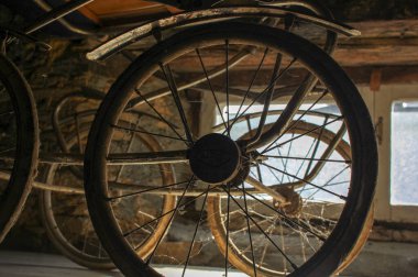 my old baby carriage full of spider webs in the attic