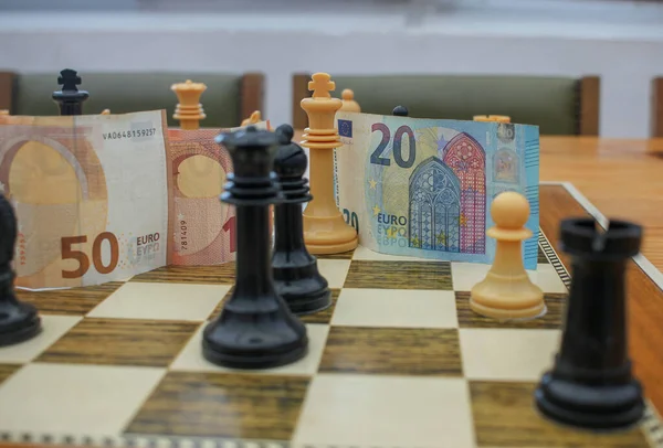 Some Banknotes Chess Pieces Chessboard — Stock Photo, Image