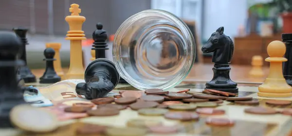 Euros Out Glass Jar Chess Pieces — Stock Photo, Image