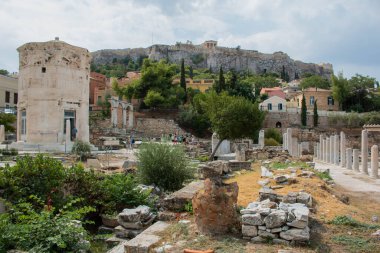 The Tower of the Winds, a tower-shaped building located in the Roman Agora in Athens, Greece. 