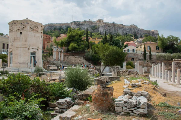 The Tower of the Winds, a tower-shaped building located in the Roman Agora in Athens, Greece. 