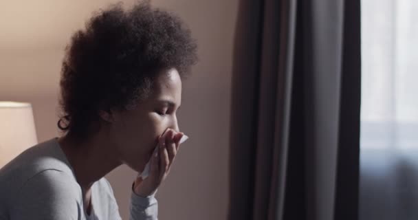 Black female coughing in morning — Stok video