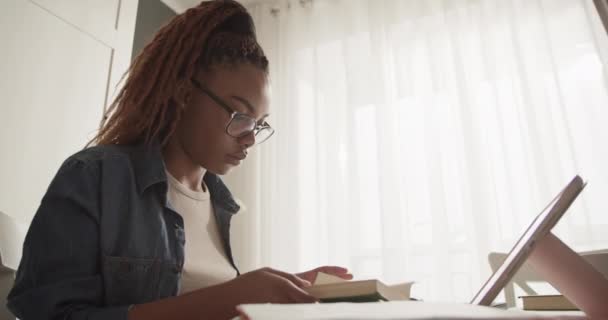 Young Black Woman Searching Data Book While Studying Home — Stok video