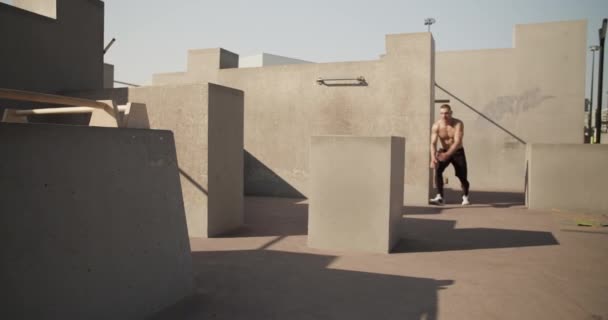 Male Athlete Running Jumping Barrier Parkour Workout — Stockvideo