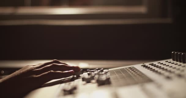 Cropped Musician Moving Levers While Working Recording Studio — Wideo stockowe