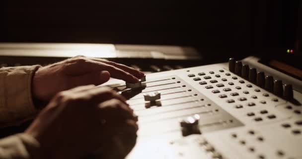 Cropped Man Tuning Controls Soundboard Dim Recording Studio — Stockvideo