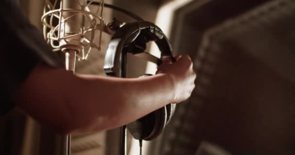 Black Woman Taking Headset Microphone Stand Recording Studio — Vídeo de stock