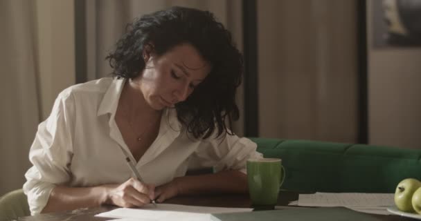 Female Entrepreneur White Blouse Sipping Coffee Mug Doing Paperwork While — Vídeo de Stock