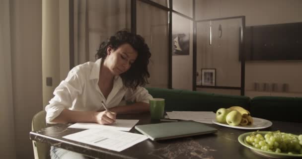 Female Entrepreneur White Blouse Sipping Coffee Mug Doing Paperwork While — Vídeo de Stock