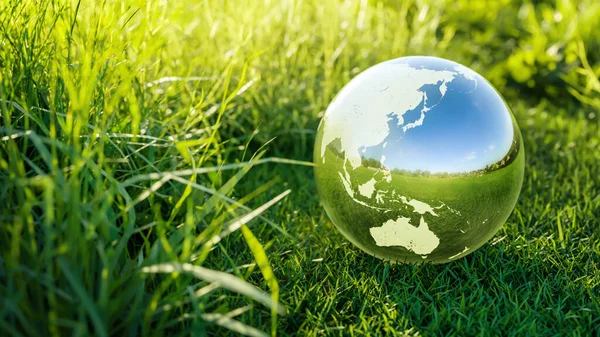 Planet Earth Crystal Ball Green Grass Field Environmental Protection Ecology — Stockfoto