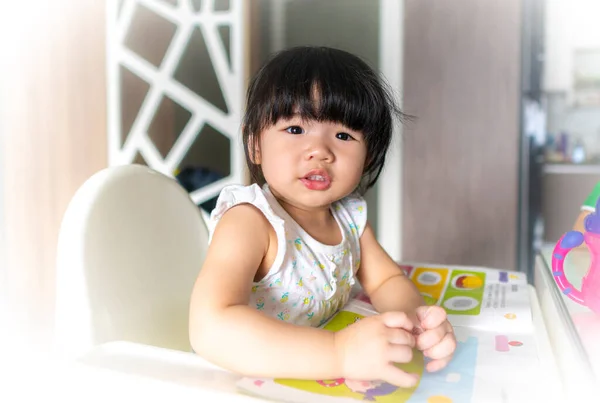 Adorable Months Baby Girl Sitting Baby Chair Reading Book Home — Foto de Stock