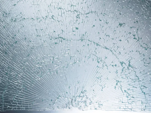 Cracked glass texture on white background. Isolated realistic cracked glass effect.