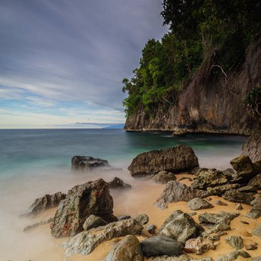 Base G beach view with rocks eroded by waves