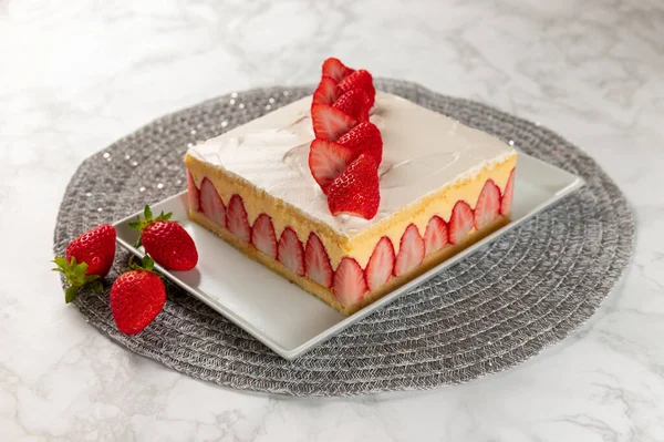 Sponge cake with strawberries and vanilla cream. Strawberry Fraisier cake
