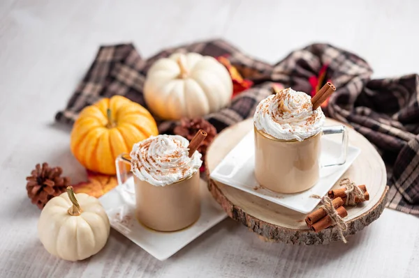 Pumpkin latte, hot caffee drink with pumpkins, whipped cream and spices