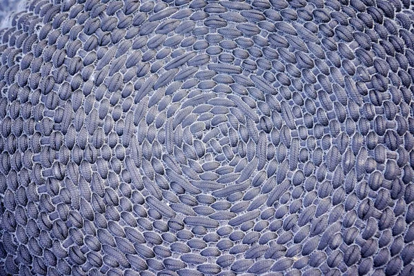 Dairesel kumaş örgü malzemesinin arkaplanı