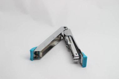 Stainless steel stapler on a white background. 