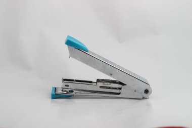 Stainless steel stapler on a white background. 